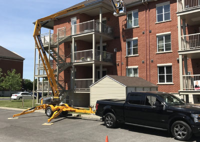 Service de nacelle dans la région de St-Hubert - Gouttières Lanaudière situé à Saint-Hubert