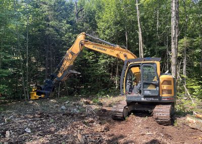 Service de déboisement a la tracto-pelle avant - Gouttières Lanaudière